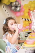 Load image into Gallery viewer, Toddler drinking from Re-Play sippy cup at party