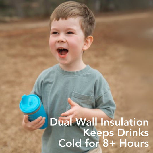 Child holding a blue sippy cup outdoors with text about dual wall insulation.